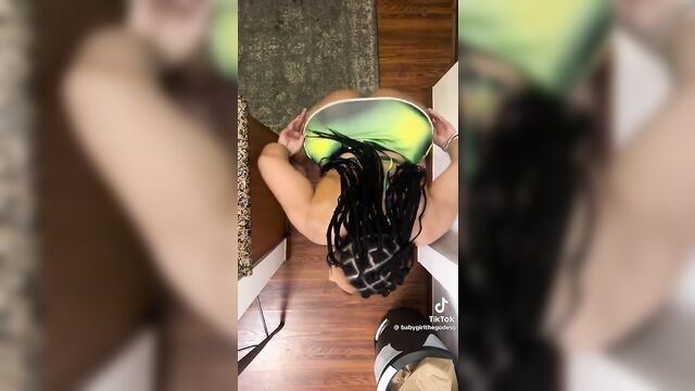 A woman with a big ass shakes it on a black cock