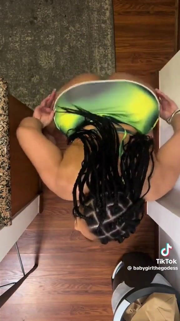 A woman with a big ass shakes it on a black cock