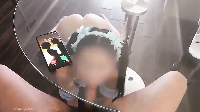 The chink gets his dick sucked under the table while his wife calls