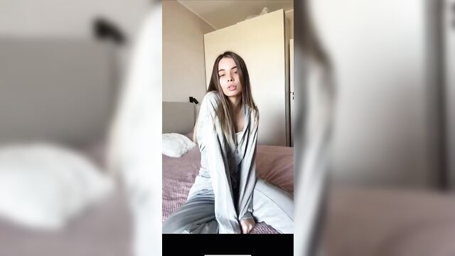 A cute blonde girl shows her body in a tiktok video