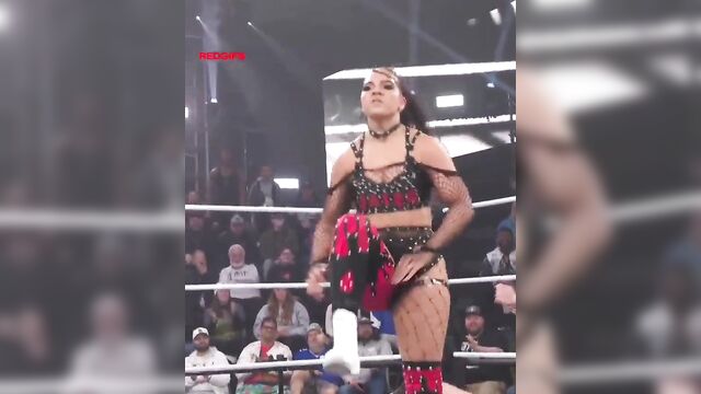 The hot girl is dancing with a great ass in thongs