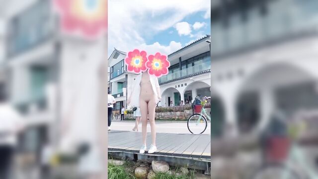 An unbuttoned shirt is not enough to cover an asian girl’s body in public
