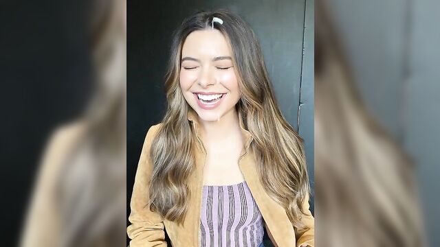 Deepfake porn with the face of miranda cosgrove on a body of a brunette