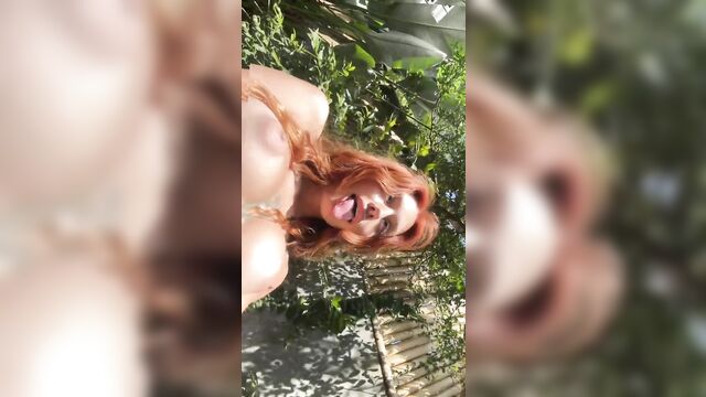 Redhead's perky tits & tongue tease nude scene is now available!