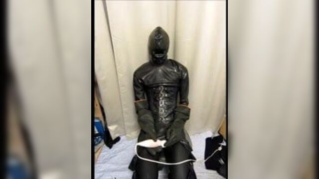 Rubber man wanking